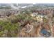 Aerial view of house and surrounding wooded area at 130 Wesleyan Way, Oxford, GA 30054