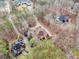 Aerial view of house and surrounding wooded area at 130 Wesleyan Way, Oxford, GA 30054