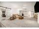 Finished basement with a large living area and built-in features at 130 Wesleyan Way, Oxford, GA 30054