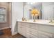 Bathroom with double vanity, and updated fixtures at 130 Wesleyan Way, Oxford, GA 30054