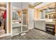 Elegant bathroom with soaking tub, double vanity, and walk-in shower at 130 Wesleyan Way, Oxford, GA 30054