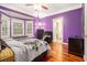 Spacious bedroom with hardwood floors and bay window at 130 Wesleyan Way, Oxford, GA 30054
