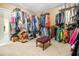 Large walk-in closet with ample hanging space and shelving at 130 Wesleyan Way, Oxford, GA 30054