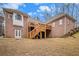 Brick house exterior with a large deck and stairs at 130 Wesleyan Way, Oxford, GA 30054