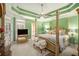 Large main bedroom with a king-size bed, and ceiling fan at 130 Wesleyan Way, Oxford, GA 30054