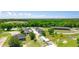 Expansive aerial view of equestrian facilities, stables, and training areas surrounded by lush greenery at 8587 Seabiscuit Rd, Lithonia, GA 30058