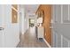 Inviting home entry features hardwood floors and decoratively appointed walls at 8587 Seabiscuit Rd, Lithonia, GA 30058