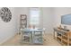 Cozy home office features stylish desk, bookcase and decor at 8587 Seabiscuit Rd, Lithonia, GA 30058