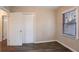 Charming bedroom with double doors and a window at 2906 Monterey Dr, Decatur, GA 30032