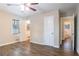 Main bedroom with private bathroom access and ceiling fan at 2906 Monterey Dr, Decatur, GA 30032
