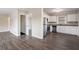 Open dining area with vinyl flooring and view of the kitchen at 2906 Monterey Dr, Decatur, GA 30032