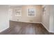 Open living space with neutral walls and vinyl flooring at 2906 Monterey Dr, Decatur, GA 30032