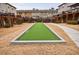 Community bocce ball court with manicured green at 4116 Townsend Ln, Dunwoody, GA 30346