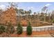 Curving community path with a scenic wooded backdrop and bridge at 4116 Townsend Ln, Dunwoody, GA 30346