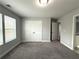 Bright bedroom with neutral walls and double door closet at 2148 Lilac Ln, Decatur, GA 30032