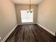 Bright dining room with hardwood floors and a chandelier at 2148 Lilac Ln, Decatur, GA 30032