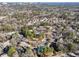 Condominiums surrounded by trees with distant city view at 4676 Vinings Central Se Run # 104, Atlanta, GA 30339