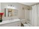 Updated bathroom with white vanity and bathtub shower combo at 4676 Vinings Central Se Run # 104, Atlanta, GA 30339