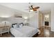 Spacious bedroom with hardwood floors and ensuite bathroom access at 4676 Vinings Central Se Run # 104, Atlanta, GA 30339