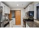 Kitchen with granite countertops and stainless steel appliances at 4676 Vinings Central Se Run # 104, Atlanta, GA 30339