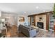 Open living area with hardwood floors and fireplace at 4676 Vinings Central Se Run # 104, Atlanta, GA 30339