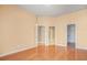 Spacious bedroom with hardwood floors and access to bathroom and closet at 4008 Orchard Hill Ter, Stone Mountain, GA 30083