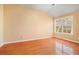Bright bedroom with hardwood floors and large window at 4008 Orchard Hill Ter, Stone Mountain, GA 30083