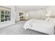 Light-filled bedroom with neutral decor and en-suite bathroom at 620 Regency Forest Ct, Atlanta, GA 30342