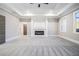 Spacious main bedroom features a fireplace, tray ceiling, and ample natural light at 1010 Nours Cir, Lawrenceville, GA 30045