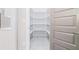 Walk in pantry with custom shelving for plenty of storage at 1010 Nours Cir, Lawrenceville, GA 30045