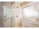 Large bathroom with a walk-in shower and glass enclosure at 1170 Brookhaven Woods Ne Ct, Atlanta, GA 30319