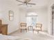 Cozy bedroom with two chairs and a window seat at 1170 Brookhaven Woods Ne Ct, Atlanta, GA 30319