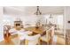 Spacious dining area with large wooden table and modern lighting at 1170 Brookhaven Woods Ne Ct, Atlanta, GA 30319