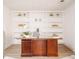 Bright home office with built-in shelves and a large desk at 1170 Brookhaven Woods Ne Ct, Atlanta, GA 30319