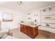 Elegant home office with built-in shelves and a large desk at 1170 Brookhaven Woods Ne Ct, Atlanta, GA 30319