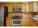 Modern kitchen features granite countertops and stainless steel appliances at 1170 Brookhaven Woods Ne Ct, Atlanta, GA 30319