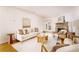 Bright living room features stone fireplace, hardwood floors, and comfy seating at 1170 Brookhaven Woods Ne Ct, Atlanta, GA 30319