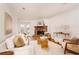 Bright living room features stone fireplace, hardwood floors, and comfy seating at 1170 Brookhaven Woods Ne Ct, Atlanta, GA 30319