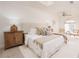 Spacious main bedroom with a large bed and sitting area at 1170 Brookhaven Woods Ne Ct, Atlanta, GA 30319
