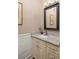 Chic bathroom with a granite vanity, framed mirror, and decorative wall accents at 384 Angier Ne Ct, Atlanta, GA 30312