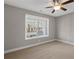 Bright bedroom with ceiling fan and a large window with blinds at 2071 Imperial Pond, Powder Springs, GA 30127