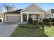 Gray siding two-car garage charming craftsman style home at 2071 Imperial Pond, Powder Springs, GA 30127