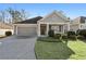 Gray siding two-car garage charming craftsman style home at 2071 Imperial Pond, Powder Springs, GA 30127