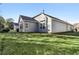 Gray siding, large windows, and a grassy yard at 2071 Imperial Pond, Powder Springs, GA 30127