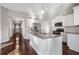 Modern kitchen with white cabinets, granite counters, and stainless steel appliances at 2071 Imperial Pond, Powder Springs, GA 30127