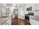 Modern kitchen with white cabinets and granite countertops at 2071 Imperial Pond, Powder Springs, GA 30127