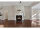 Fireplace in living room with hardwood floors and neutral walls at 2071 Imperial Pond, Powder Springs, GA 30127