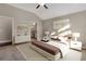 Main bedroom with virtually staged furniture and ensuite bathroom access at 2071 Imperial Pond, Powder Springs, GA 30127