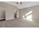 Spacious main bedroom with carpeted floor and ensuite bathroom access at 2071 Imperial Pond, Powder Springs, GA 30127