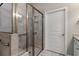 Large walk-in shower with glass enclosure and neutral tile at 2071 Imperial Pond, Powder Springs, GA 30127